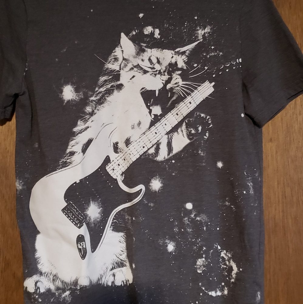 Boys Cat Rockin on the guitar